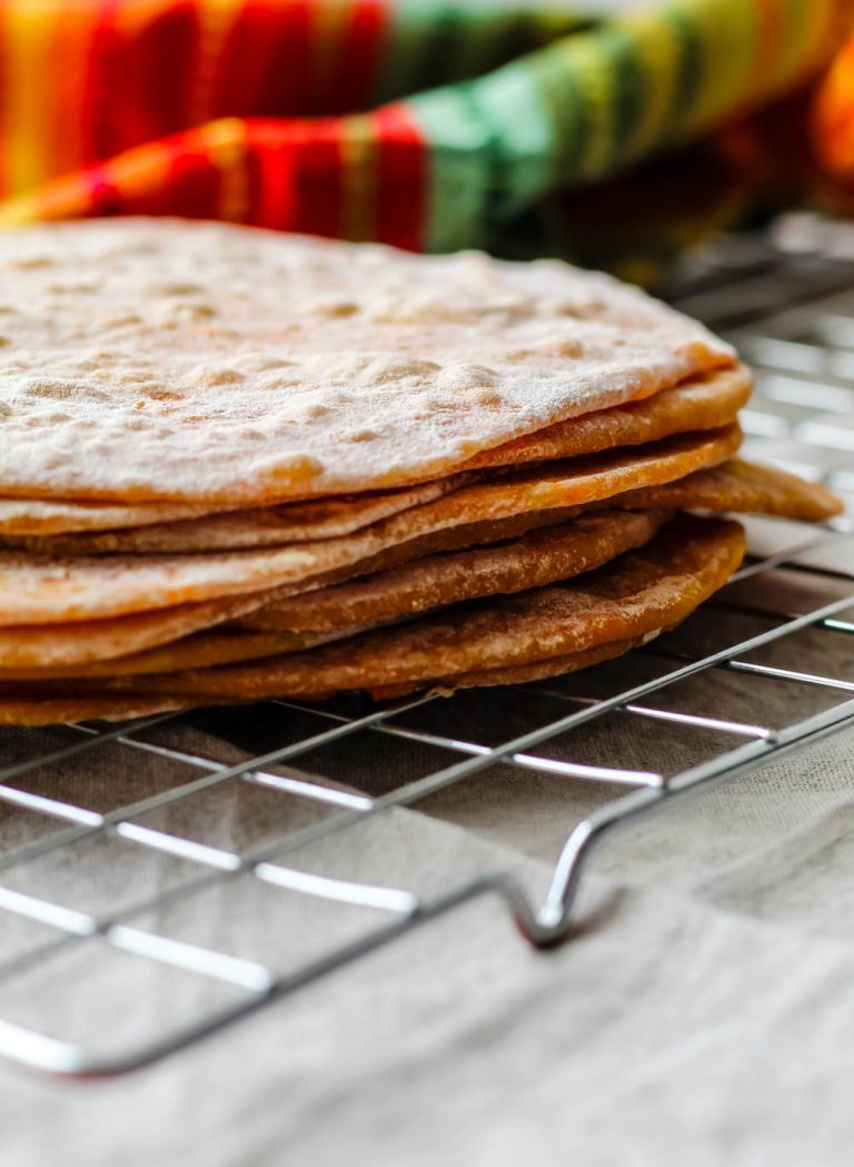 straight on shot of a stack of sweet potato spelt tortillas