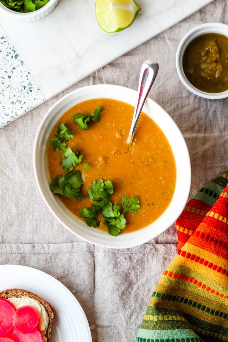 overhead shot of the quinoa white bean sweet potato soup in a bowl