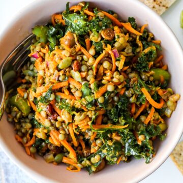close up photo of a bowl of carrot lentil salad