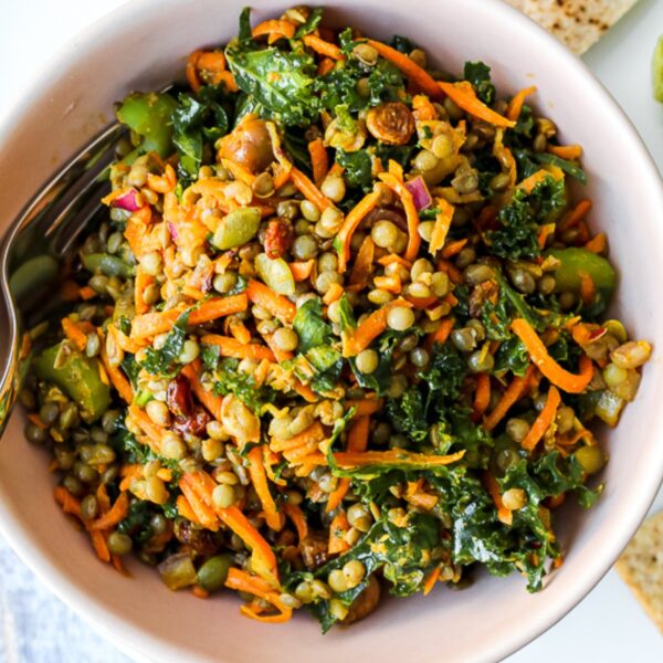 close up photo of a bowl of carrot lentil salad