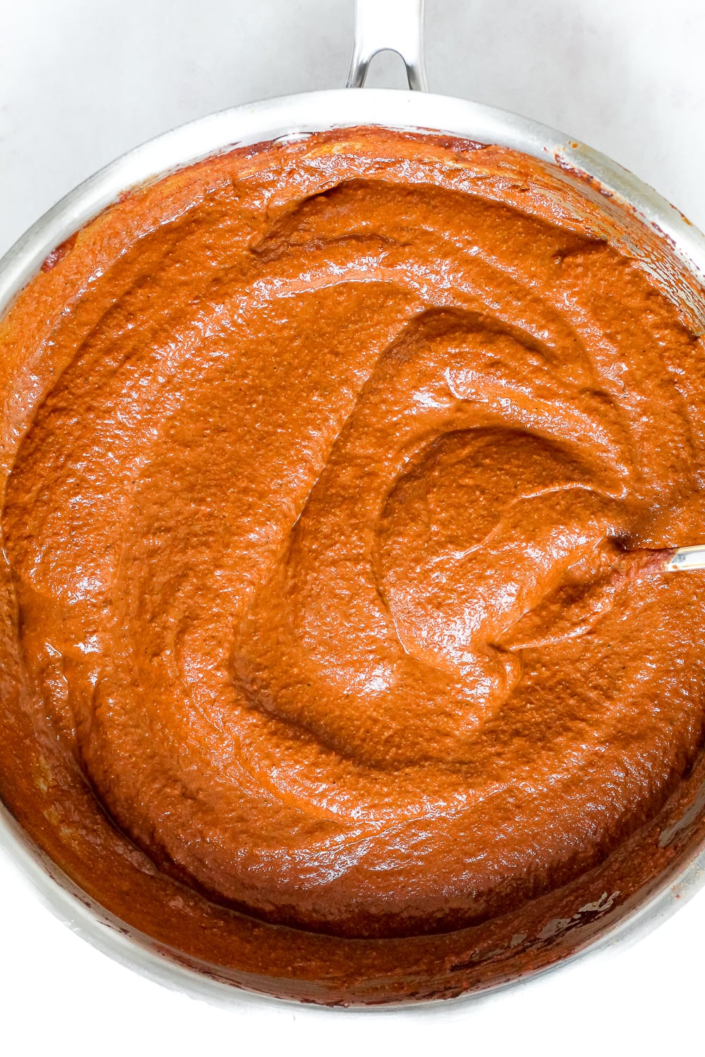 overhead shot of the mole sauce in a skillet