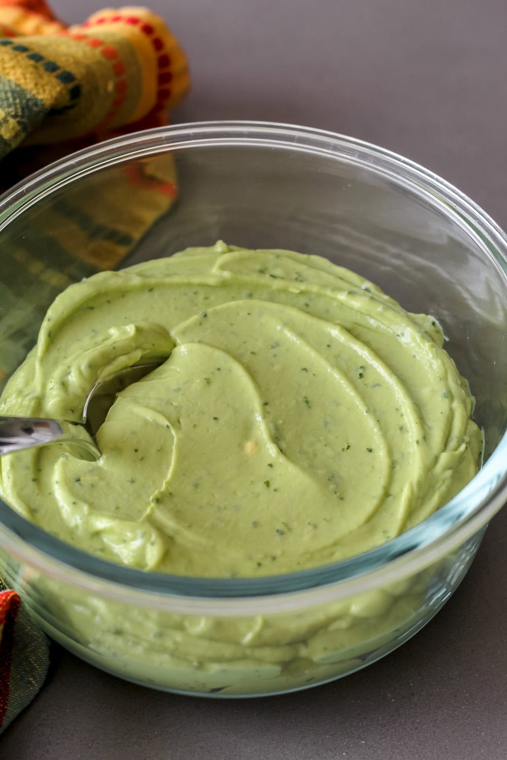 a close-up photo of a dish of avocado crema