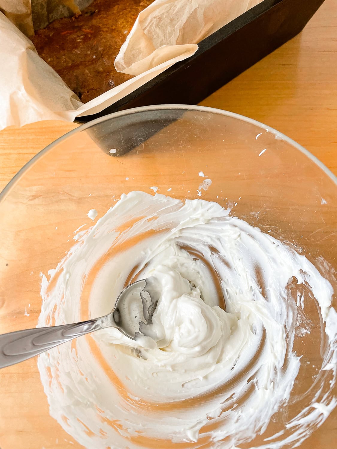 process photo of the cream cheese icing in a bowl 