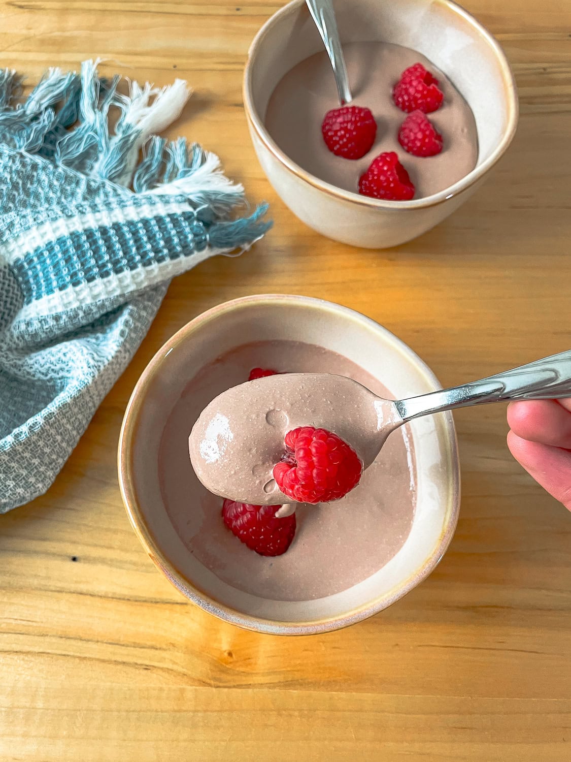 a spoonful of the pudding on a spoon 