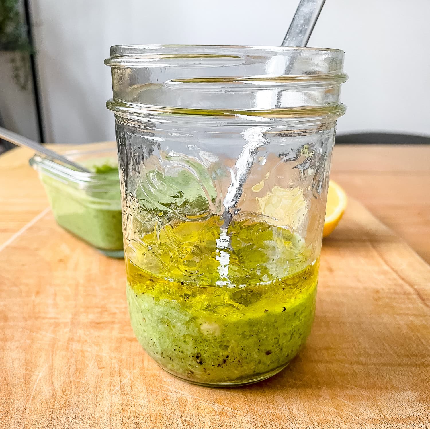 process photo of the dressing ingredients in a glass jar prior to mixing everything together